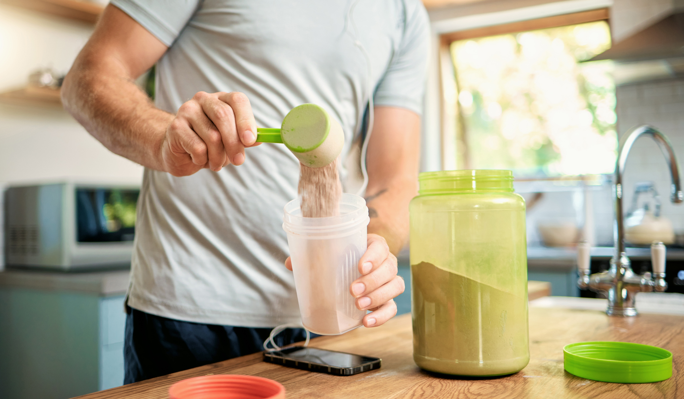 Man drinking protein shake after semaglutide treatment